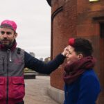 Pedal Me and Zöe Garbett talk animatedly outside Greenwich Foot Tunnel